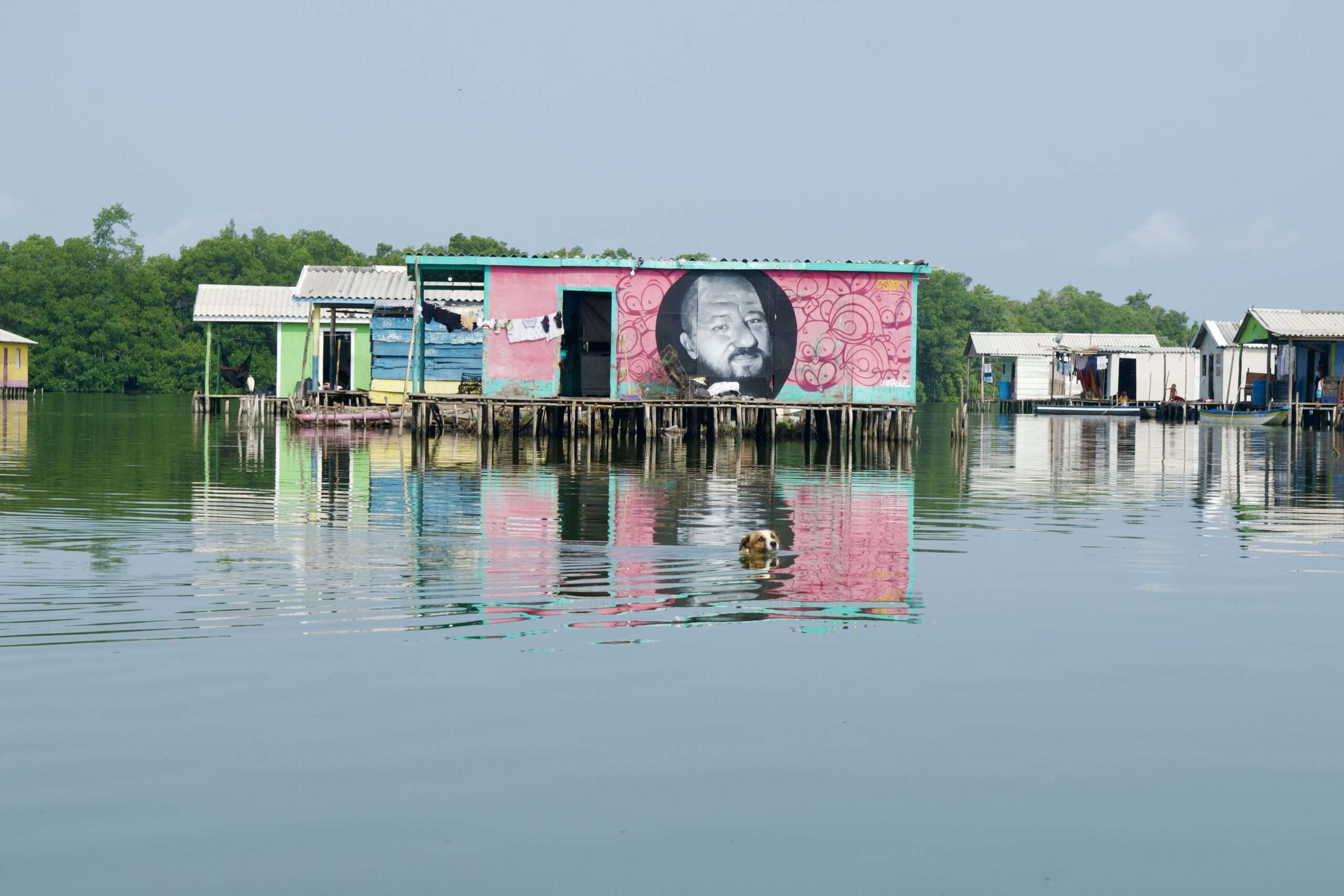 Cienaga Grande Palafito Villages Mural: colorful tribute to coastal communities on the water.